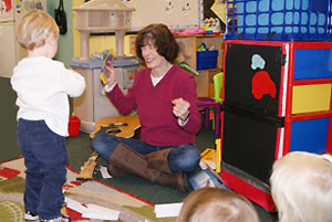 Teacher leading children