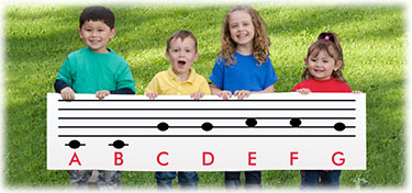 Children holding sing materials